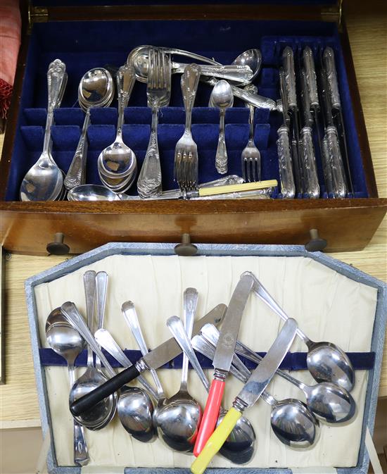 A 1930s canteen of plated cutlery and a stainless steel canteen